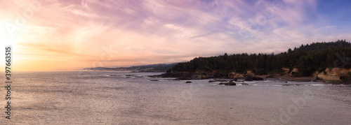 Beautiful Panoramic View of Lincoln Beach on the Pacific Ocean Coast during a cloudy summer day. Taken in Boiler Bay State Scenic Viewpoint, Oregon, United States. Colorful Sunset Sky.