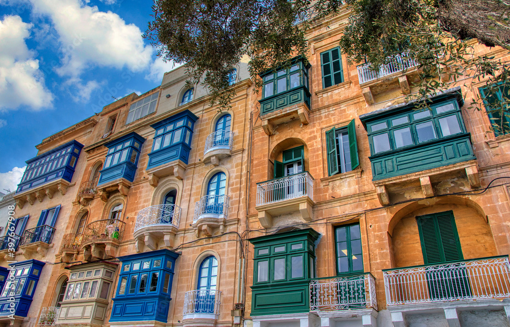 Typical architecture in Malta, wooden colorful balconies, Valleta, Malta