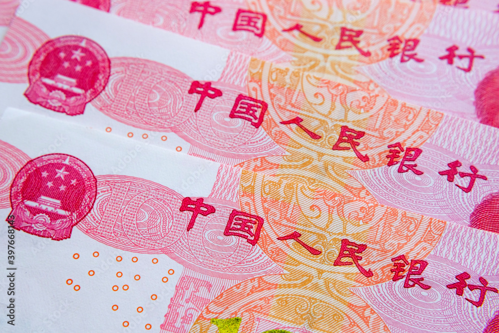 Part of Chinese yuan renminbi banknotes with words in Chinese which translate as 