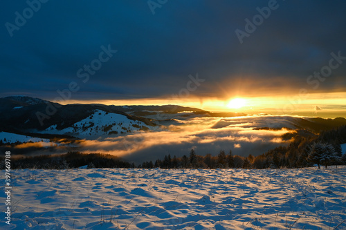 Sonnenuntergang   ber dem Rheintal im Winter