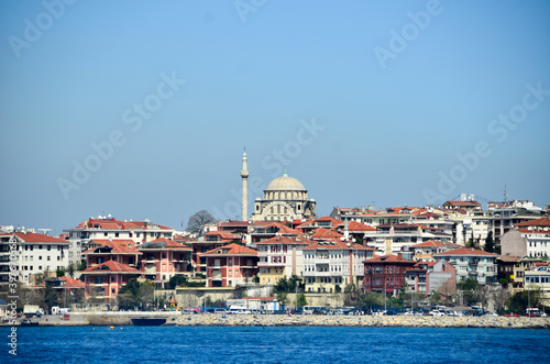 Istanbul, Turkey – April 24, 2012: View of Uskudar that is the oldest part of East Istanbul. Photo was shot from a ship. Uskudar view with old buildings and mosque.