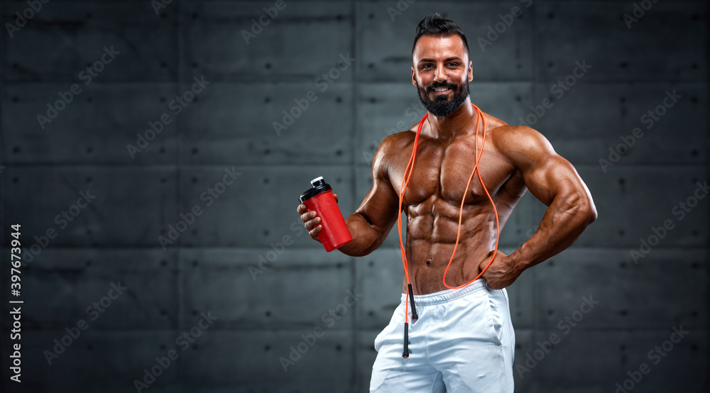 Nutritional Supplement. Muscular Men Drinks Protein, Energy Drink After