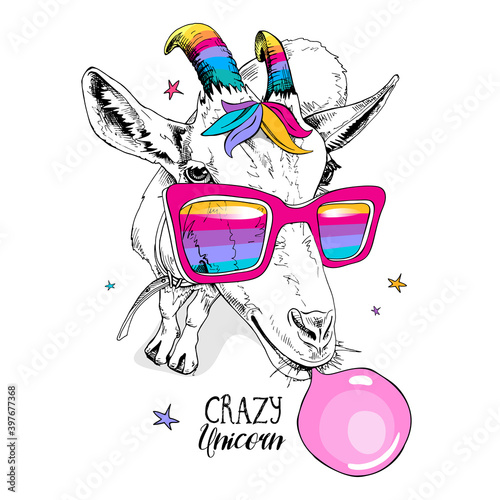 Fun Goat in a unicorn mask: rainbow glasses, colored horns, bangs and with a pink bubble gum. Humor card, t-shirt composition, hand drawn style print. Vector illustration.