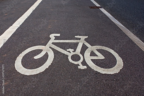 Sign white cycle/bicycle painted on the ground. Cycle path. UK