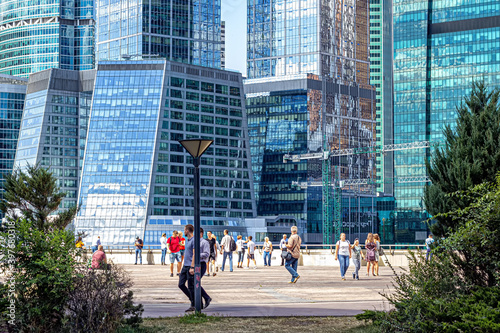 View of the business center of Moscow city and the observation deck filled with tourists
