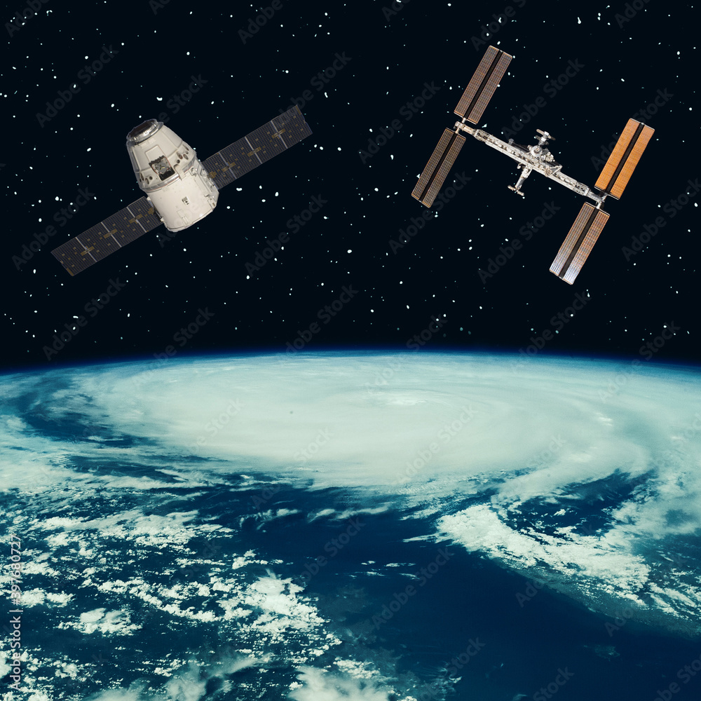 Satellites above the earth. The elements of this image furnished by NASA. Satellites above the earth. The elements of this image furnished by NASA.