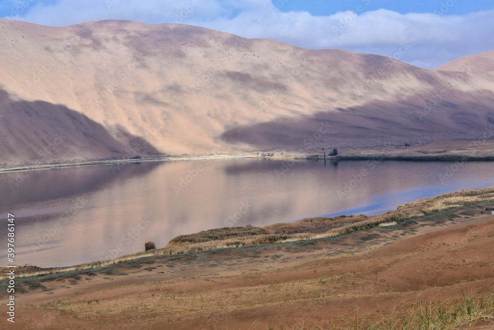 Sumu Barun Jaran Lake-mirroring dark water. Badain Jaran Desert-Inner Mongolia-China-1152
