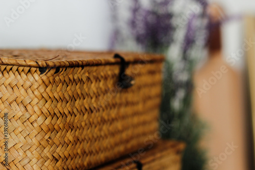 Wicker baskets on a lavender background