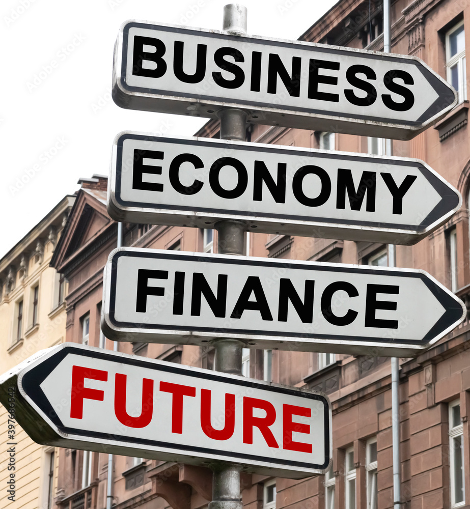 The road indicator on the arrows of which is written - business, economics, finance and FUTURE The road indicator on the arrows of which is written - business, economics, finance and FUTURE