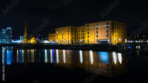 Merseyside Maritime Museum reflects in the water photo