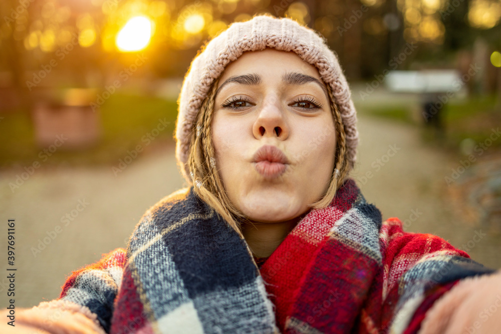 Self portrait of playful young woman outdoors
Self portrait of playful young woman outdoors