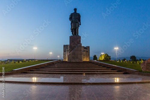 Evening view of Amir Temur (Tamerlane) statue in Shahrisabz, Uzbekistan photo