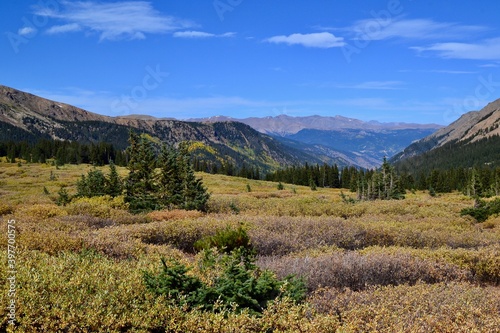 Scenic fall view from Guanella Pass, Colorado trailhead. A scenic byway with spectacular views, fall colors and blue sky over a mountainous valley. A Denver area hiking, fall color viewing destination
