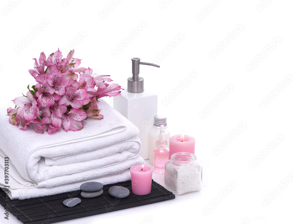 Spa setting with branch pink orchid ,stone ,candle on mat with bottle oil
Spa setting with branch pink orchid ,stone ,candle on mat with bottle oil