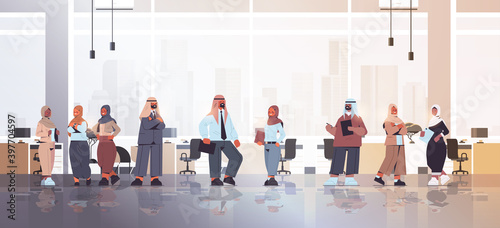 arabic businesspeople discussing during meeting arab business people standing together successful team concept office interior full length horizontal vector illustration