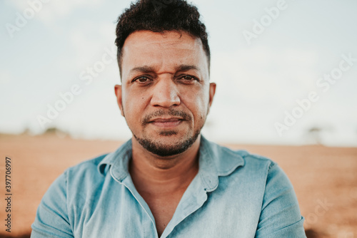 Latin American farmer. focus on man's face photo