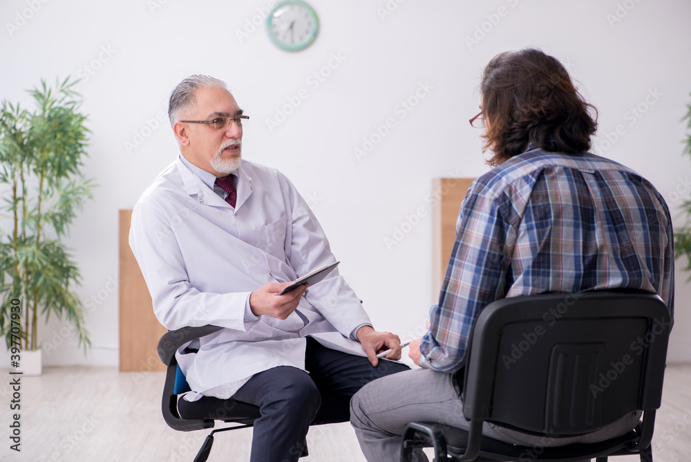 Doctor visiting patient in the hospital Doctor visiting patient in the hospital