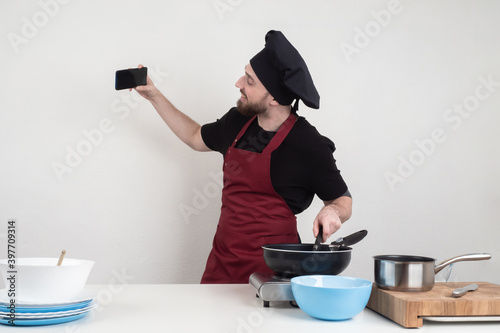 Chef guy takes pictures of ...