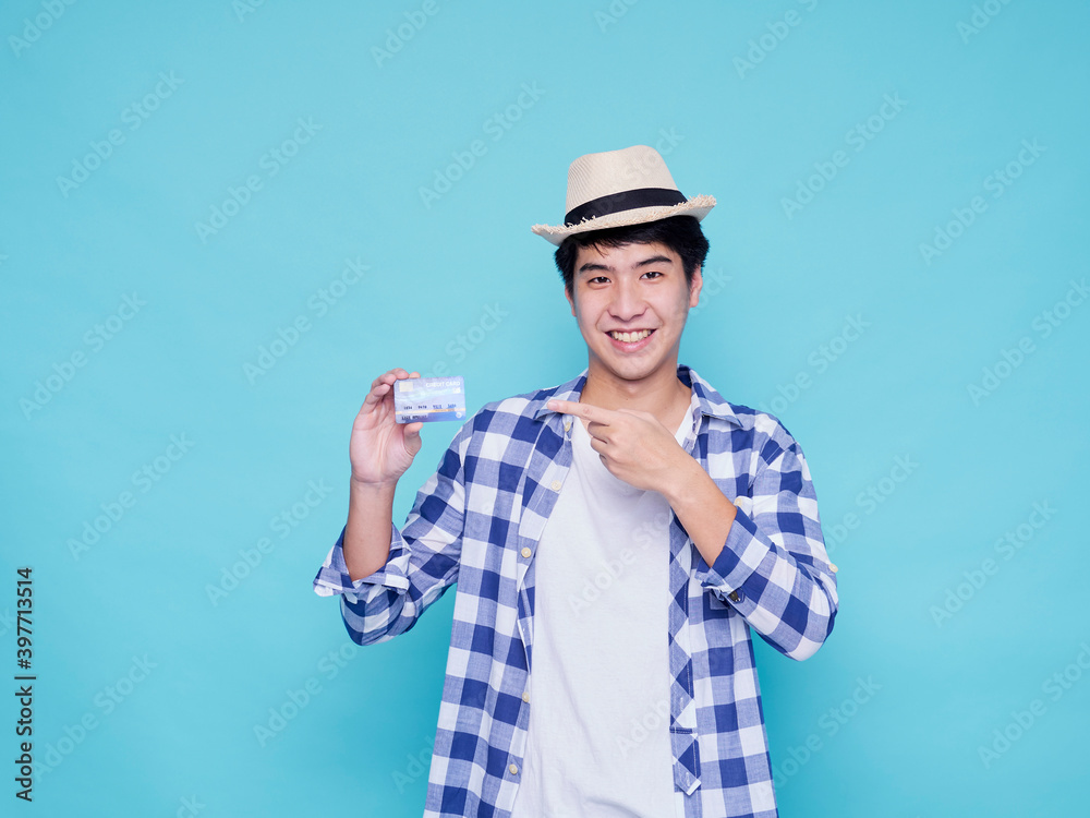 Handsome tourist man with credit card Handsome tourist man with credit card