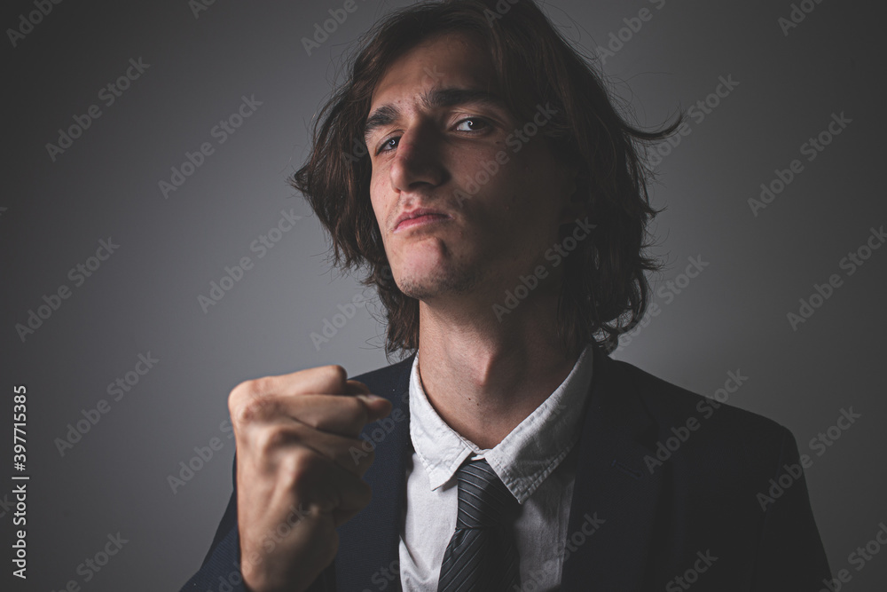 Fototapeta premium Long hair businessman