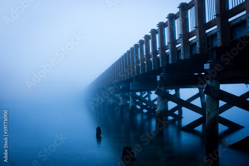 A Seaside Trestle Boardwalk into the Fog