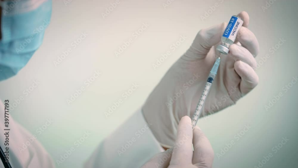 Selective focus, The COVID-19 vaccine is ready for use. Close up syringe and COVID-19 vaccine.COVID-19 vaccine concept. Selective focus, The COVID-19 vaccine is ready for use. Close up syringe and COVID-19 vaccine.COVID-19 vaccine concept.