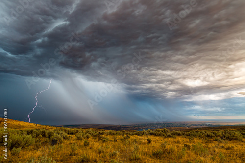 Summer thunderstorm passes over the desert near Ephrata and Soap Lake in Grant County Washington photo