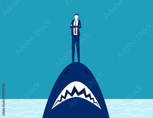 Businessman standing on shark mouth. Stand on danger