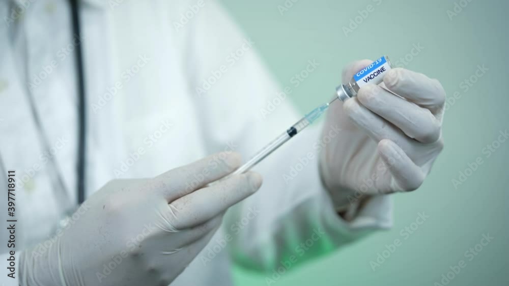 Selective focus, The COVID-19 vaccine is ready for use. Close up syringe and COVID-19 vaccine.COVID-19 vaccine concept. Selective focus, The COVID-19 vaccine is ready for use. Close up syringe and COVID-19 vaccine.COVID-19 vaccine concept.