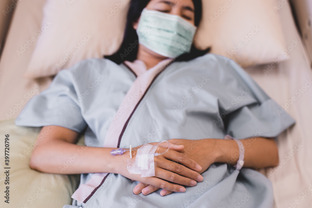 Fototapeta premium Close up of hands patient woman during sleeping on sickbed at the hospital