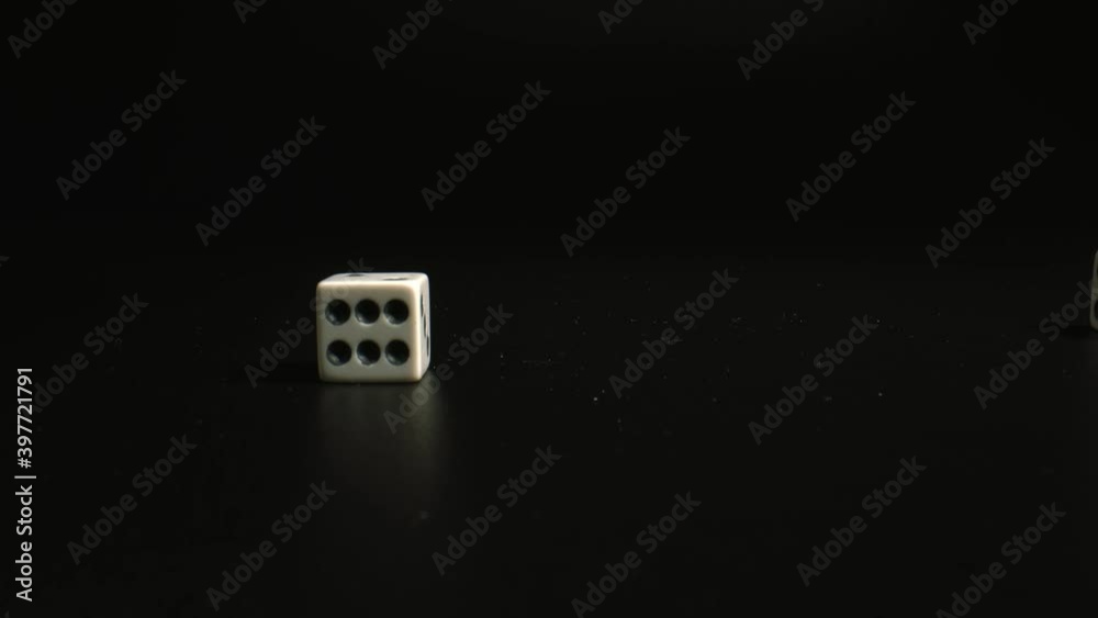Throw of the dice, tempt fate. Pair of thrown dices on black background, close up. High quality. Throw of the dice, tempt fate. Pair of thrown dices on black background, close up. High quality.
