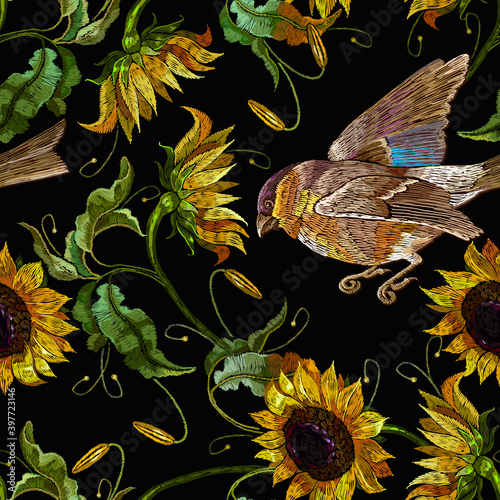 Embroidery sunflowers and birds seamless pattern. Fashion yellow summer flowers, template for clothes, tapestry, t-shirt design © Matrioshka