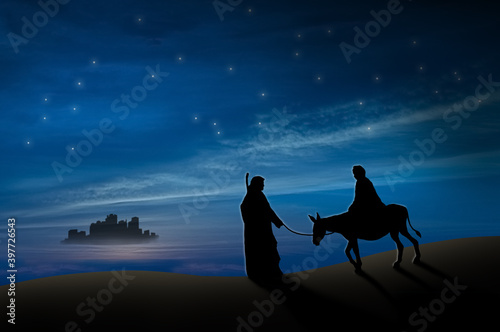Fotografija Christmas nativity scene of Joseph and Mary with donkey on the way to Bethlehem