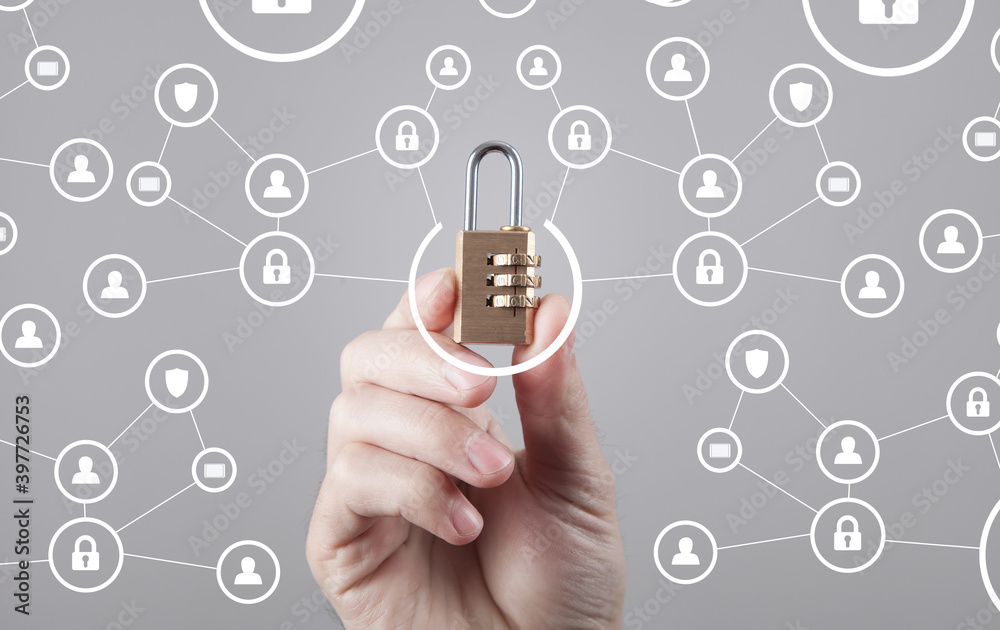 Male hand holding padlock. Internet and data security Male hand holding padlock. Internet and data security