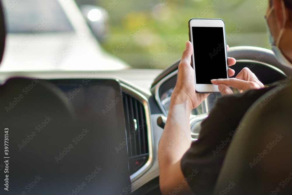 Man using mobile phone in car Man using mobile phone in car