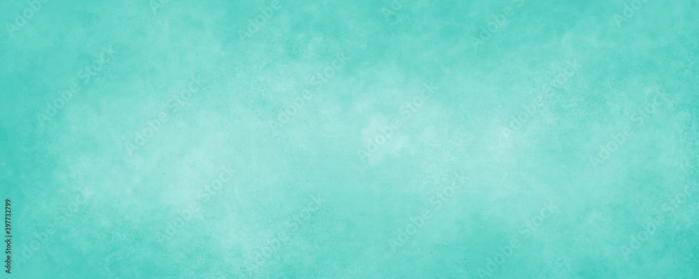 Light blue green background paper with soft grunge border texture in spring and Easter colors