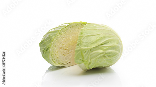 Sliced half part of fresh green cabbage isolated on white background © bongkarn