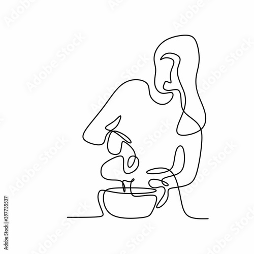 Woman baking cooking. One s...