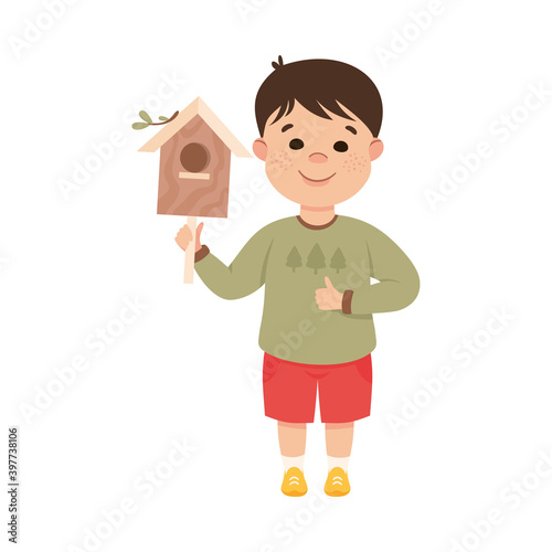 Obedient Boy with Good Breeding Holding Wooden Bird House Vector Illustration