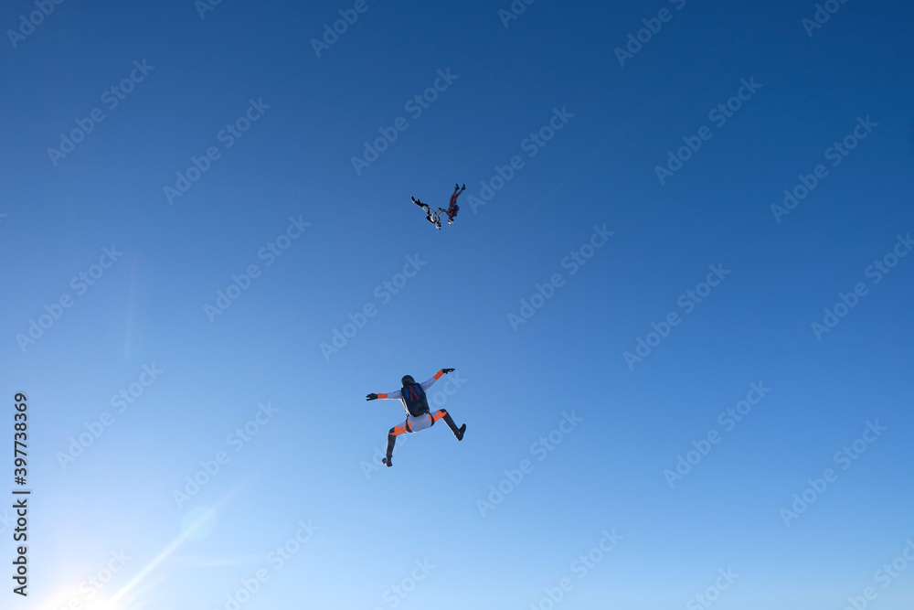 Skydiving. Three skydivers are in the sky. Skydiving. Three skydivers are in the sky.