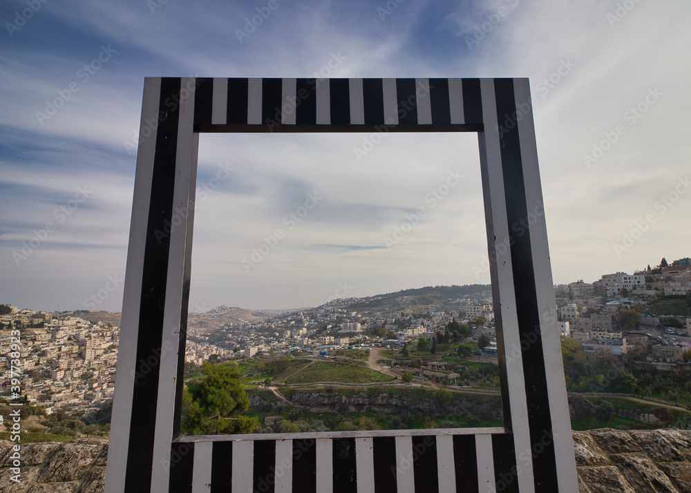 Fototapeta premium jerusalem, israel. 04-12-2020. top view from the direction of the Jewish Quarter on the east of the city, on the Silwan neighborhoods, Ma'aleh HaZeitim, Abu Tor, and Mount of Olives