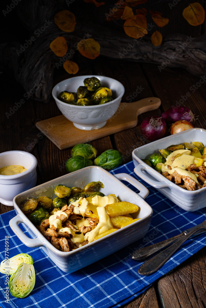 Gratinated Zurich ragout with Brussels sprouts, potatoes and Bearnaise sauce Gratinated Zurich ragout with Brussels sprouts, potatoes and Bearnaise sauce
