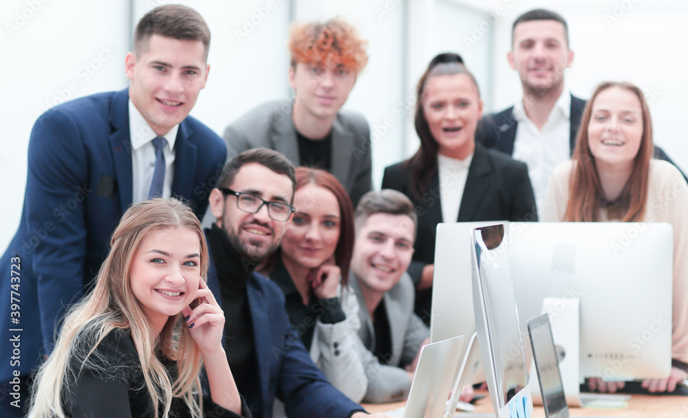 portrait of a happy business team at an office Desk portrait of a happy business team at an office Desk