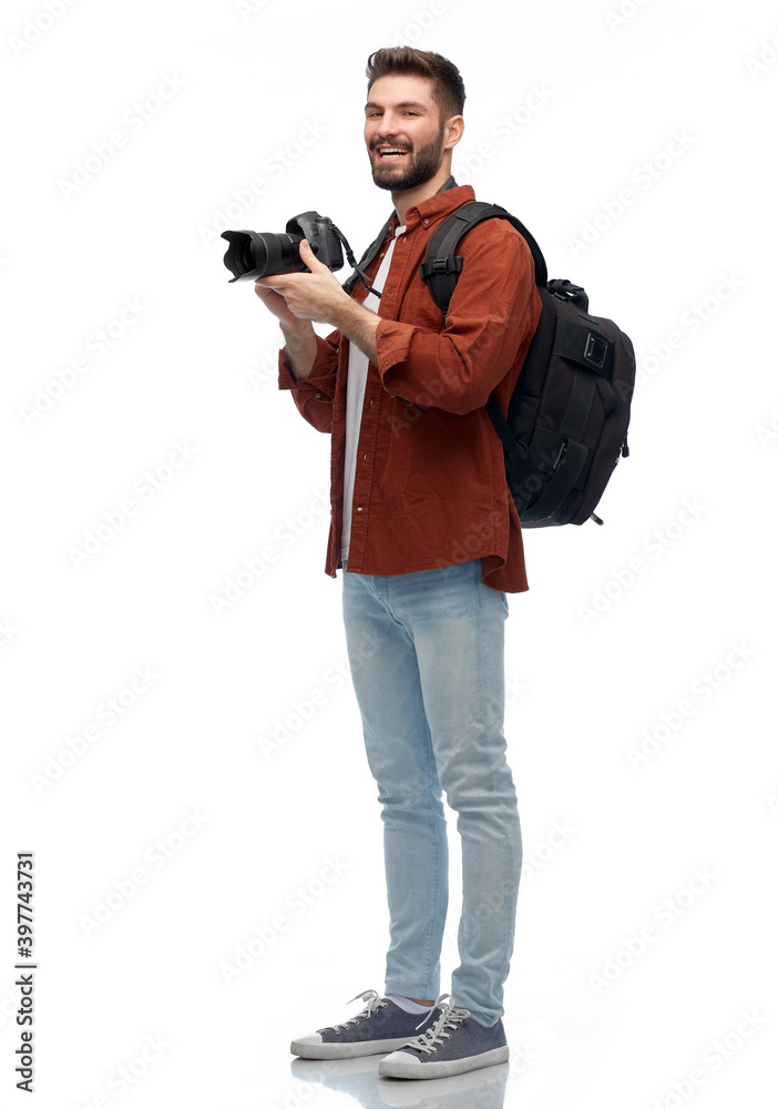 photography, travel and people and concept - happy smiling man or photographer with digital camera and backpack over white background photography, travel and people and concept - happy smiling man or photographer with digital camera and backpack over white background