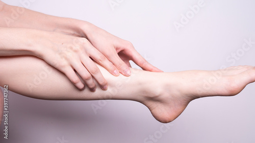 massage of leg muscles with hands, leg pain © Аркадий Коробка