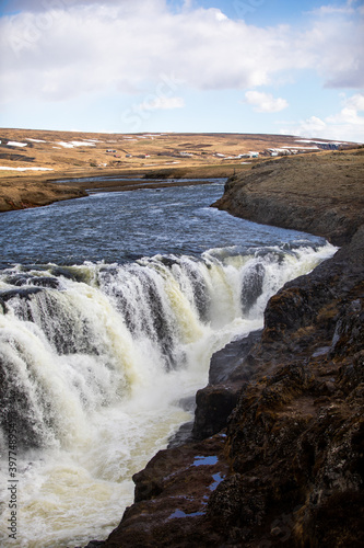 Aerial of a waterfall in Iceland in spring