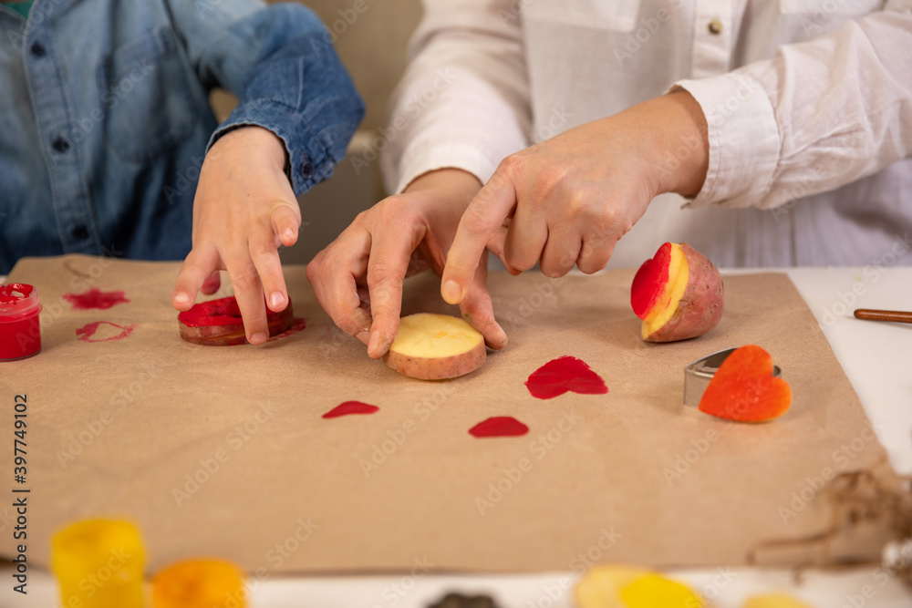 DIY potato print. handmade gift wrapping with an exclusive print pattern.