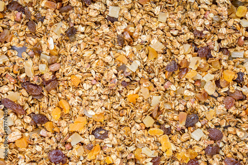 Organic crunchy homemade granola cereal with oats and berries. Oatmeal granola texture. selective focus