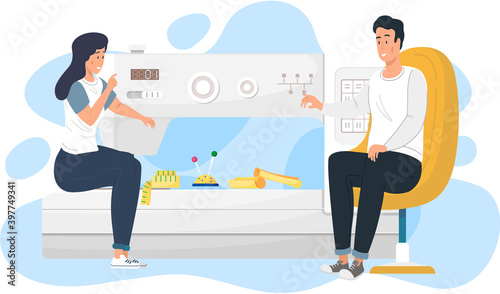 Tailoring fashionable clothes. Big sewing machine on the background. Designers are planning future garment. Couple communicates while working. A guy with a girl spending time in the fashion studio