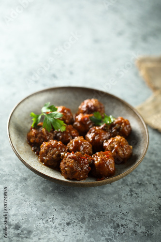 Homemade spicy meatballs with fresh parsley
